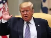7 Urgent Signals: Trump Weighing U.S. Military Action Against Iran Amid Rising War Fears Donald Trump with raised hands is talking, American flag in the background.