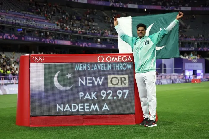 Arshad Nadeem breaking the world javelin record with a powerful throw.