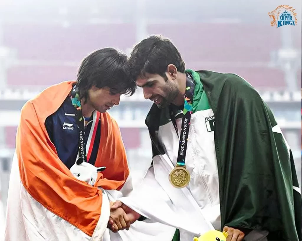 Arshad Nadeem competing against Neeraj Chopra in an intense javelin throw event.